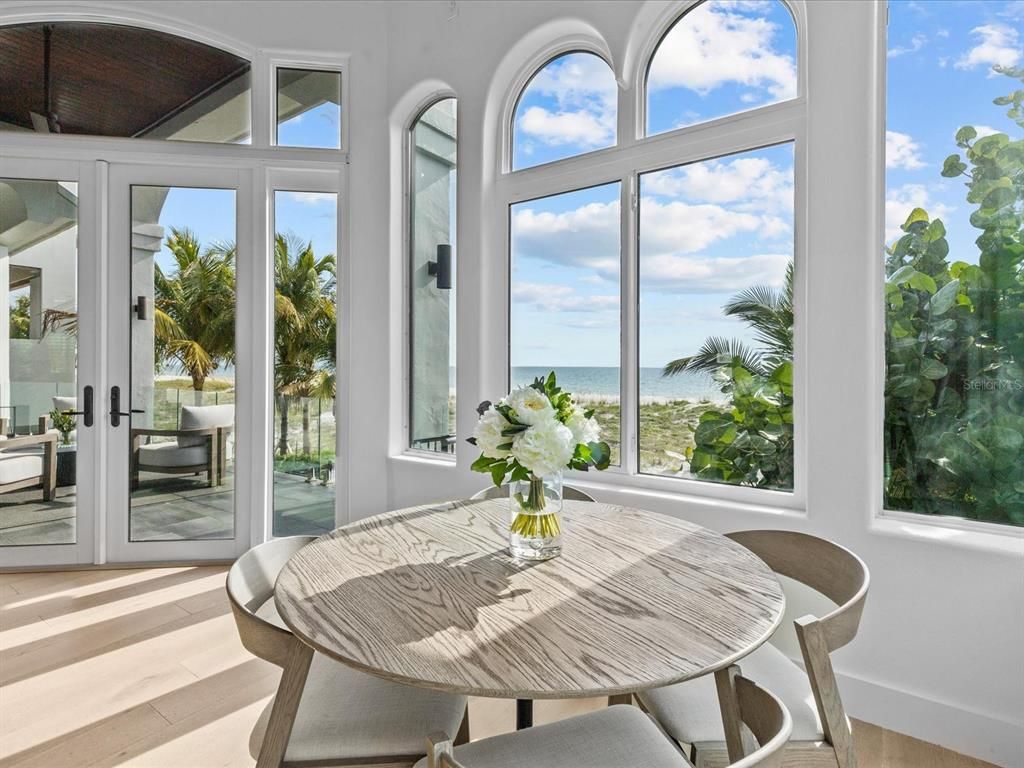 Enjoy modern elegance with breathtaking ocean views, a gourmet kitchen with marble countertops, a state-of-the-art water vapor fireplace, and over 10 TVs.
