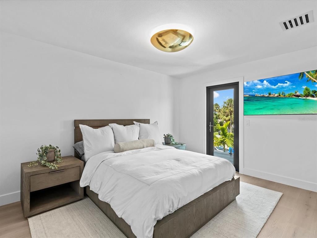 Enjoy modern elegance with breathtaking ocean views, a gourmet kitchen with marble countertops, a state-of-the-art water vapor fireplace, and over 10 TVs.