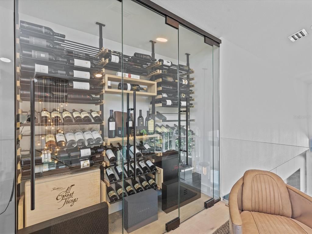 Enjoy modern elegance with breathtaking ocean views, a gourmet kitchen with marble countertops, a state-of-the-art water vapor fireplace, and over 10 TVs.