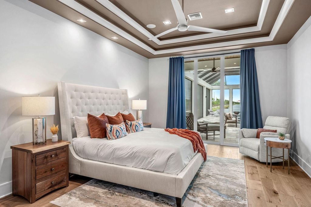 This brand-new 2024 lakefront estate, set on 0.75 acres, offers 4 bedrooms, 7 baths, and 6,299 square feet of refined living space.