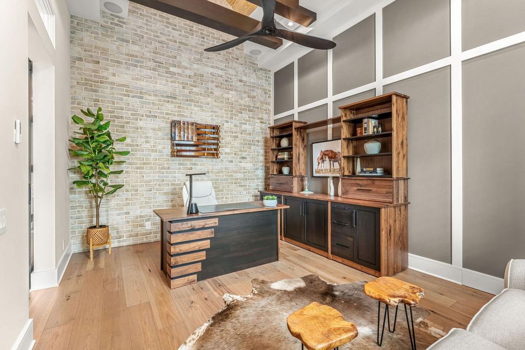 This brand-new 2024 lakefront estate, set on 0.75 acres, offers 4 bedrooms, 7 baths, and 6,299 square feet of refined living space.