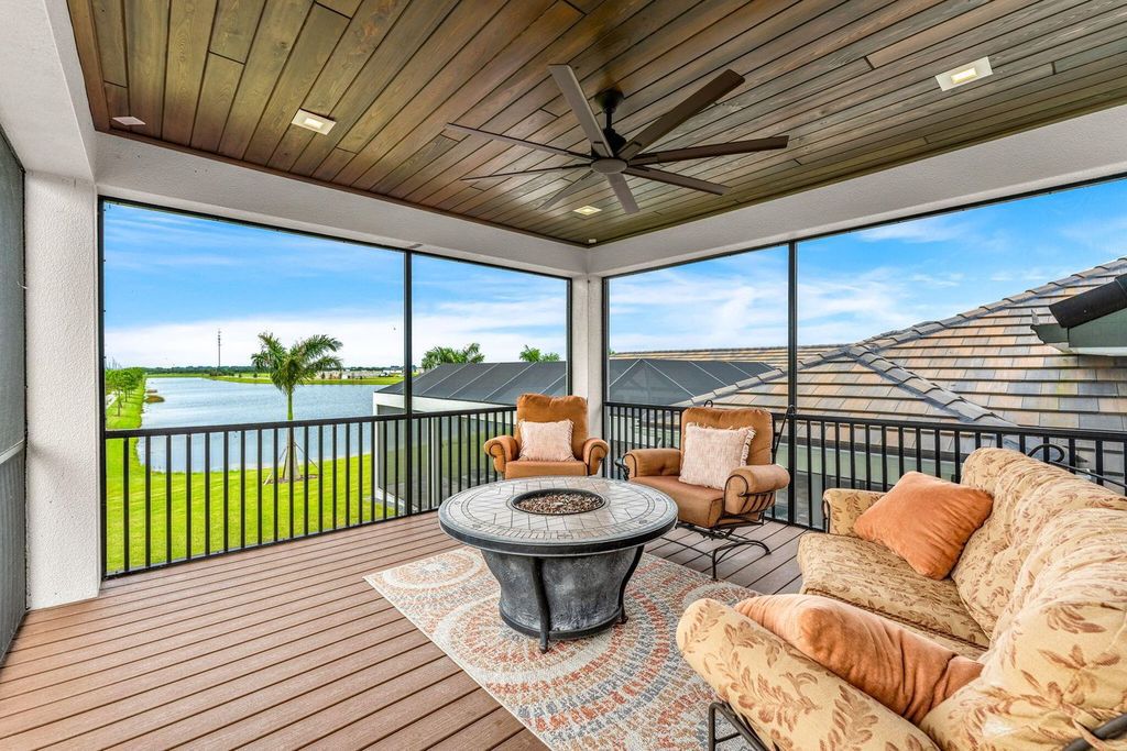 This brand-new 2024 lakefront estate, set on 0.75 acres, offers 4 bedrooms, 7 baths, and 6,299 square feet of refined living space.