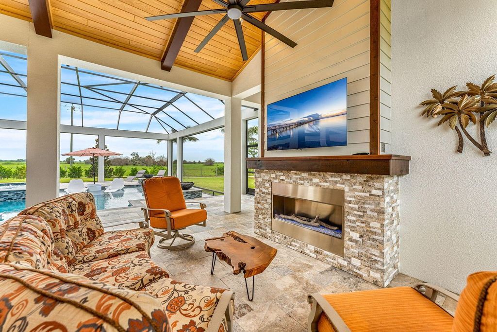 This brand-new 2024 lakefront estate, set on 0.75 acres, offers 4 bedrooms, 7 baths, and 6,299 square feet of refined living space.
