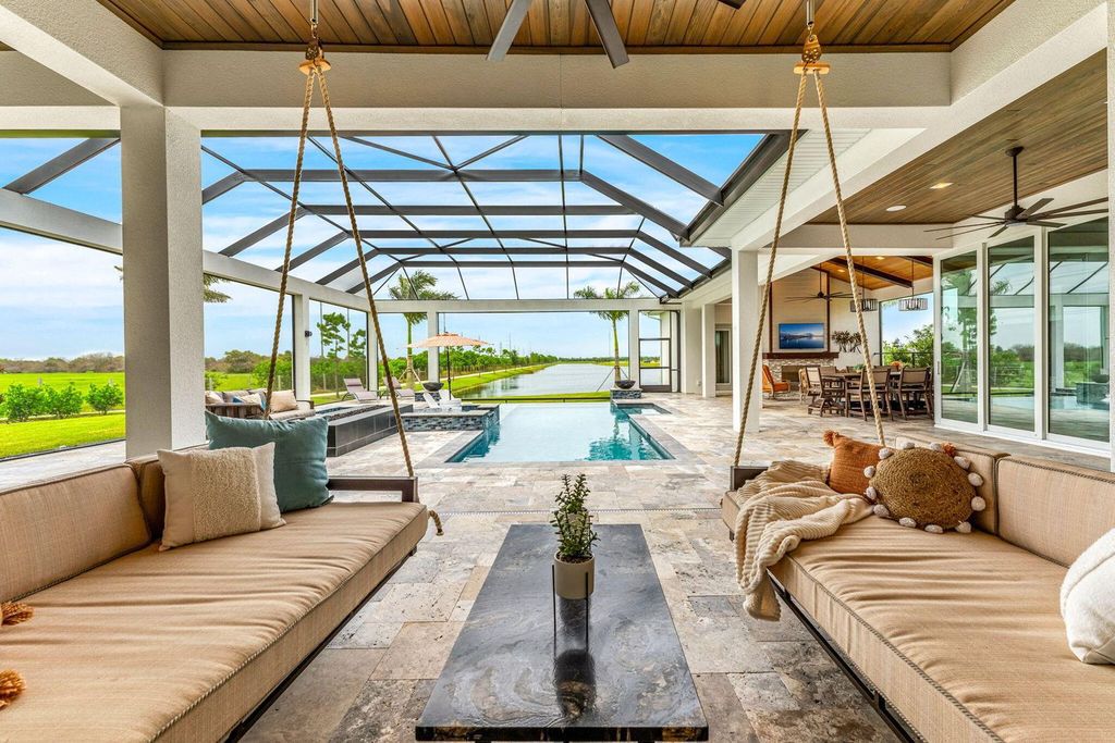 This brand-new 2024 lakefront estate, set on 0.75 acres, offers 4 bedrooms, 7 baths, and 6,299 square feet of refined living space.