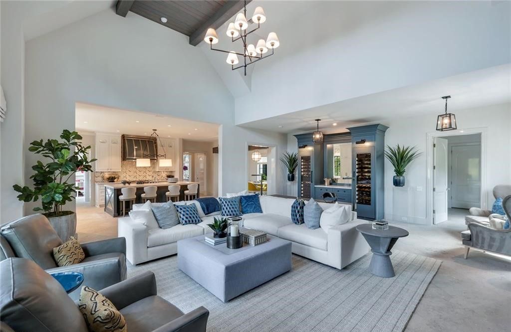 Set on nearly an acre in Audubon Country Club, this 4-bed, 6-bath home, designed by Renee Gaddis and built by the Williams Group, blends modern art deco with French countryside charm.