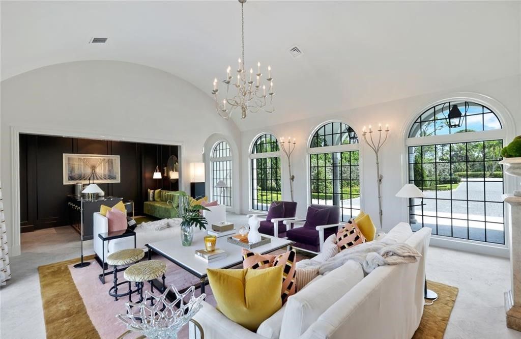 Set on nearly an acre in Audubon Country Club, this 4-bed, 6-bath home, designed by Renee Gaddis and built by the Williams Group, blends modern art deco with French countryside charm.