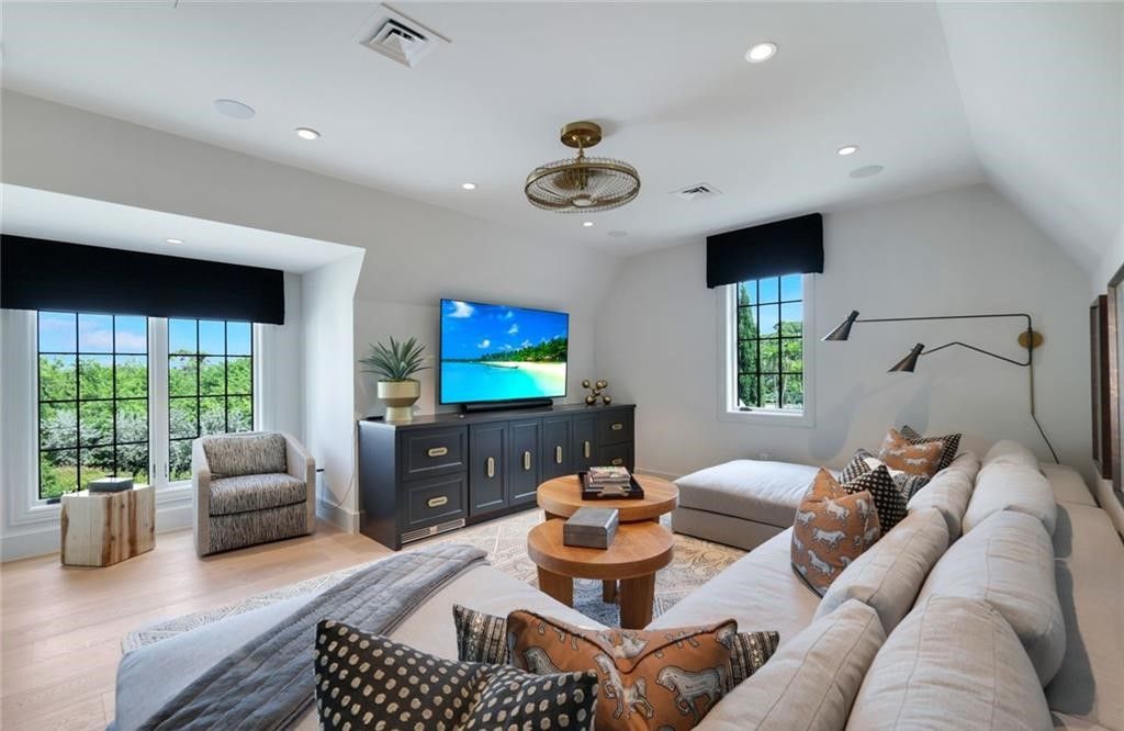 Set on nearly an acre in Audubon Country Club, this 4-bed, 6-bath home, designed by Renee Gaddis and built by the Williams Group, blends modern art deco with French countryside charm.