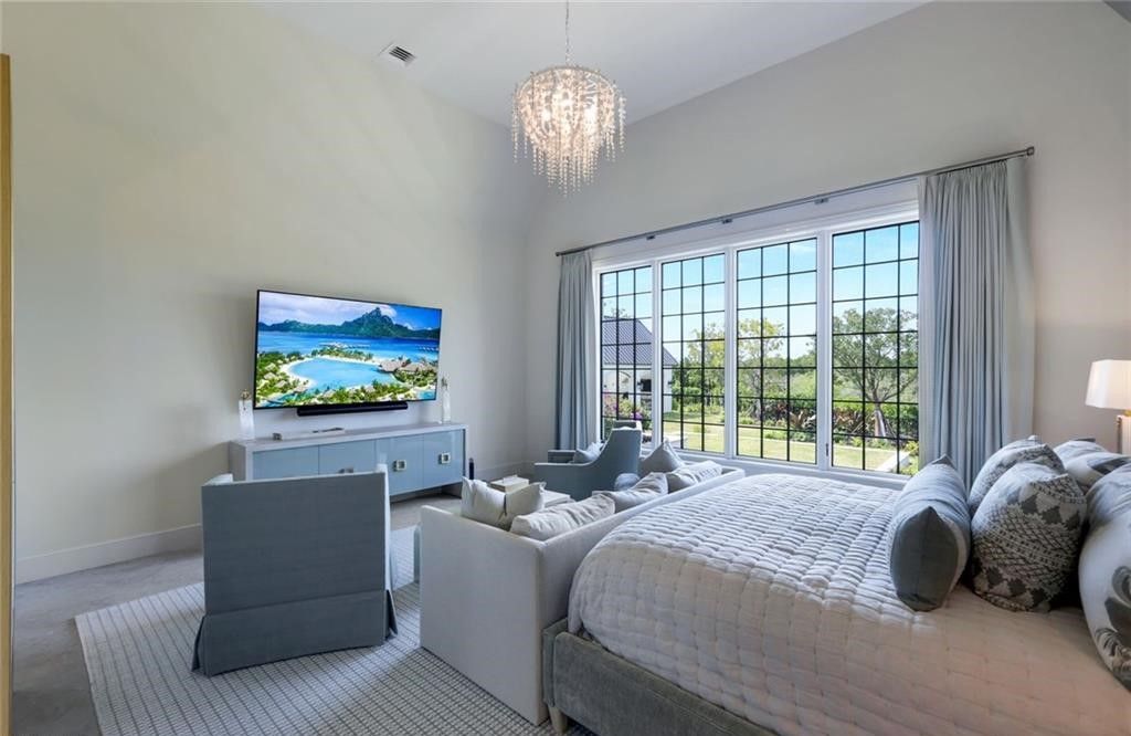 Set on nearly an acre in Audubon Country Club, this 4-bed, 6-bath home, designed by Renee Gaddis and built by the Williams Group, blends modern art deco with French countryside charm.