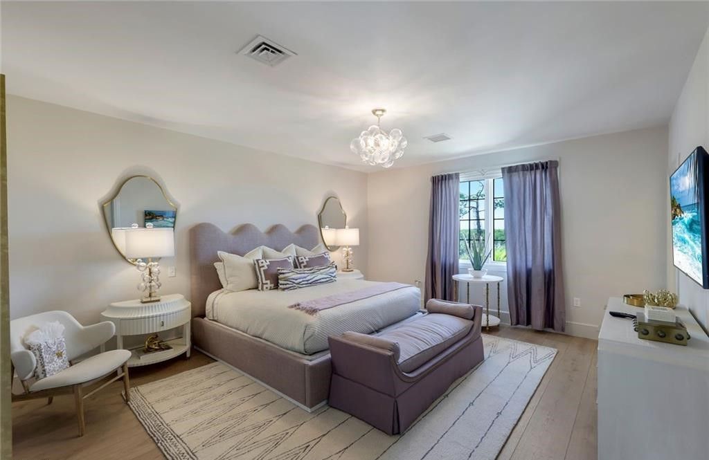 Set on nearly an acre in Audubon Country Club, this 4-bed, 6-bath home, designed by Renee Gaddis and built by the Williams Group, blends modern art deco with French countryside charm.