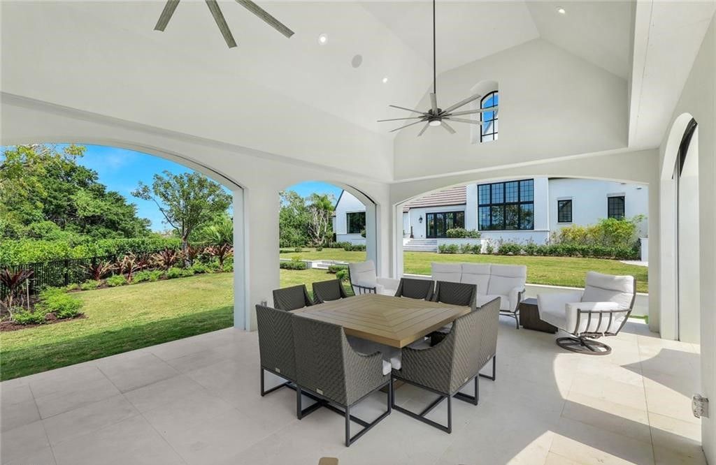 Set on nearly an acre in Audubon Country Club, this 4-bed, 6-bath home, designed by Renee Gaddis and built by the Williams Group, blends modern art deco with French countryside charm.
