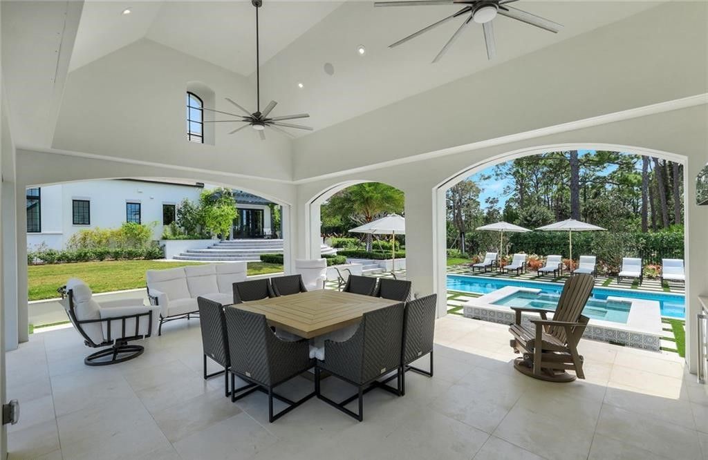 Set on nearly an acre in Audubon Country Club, this 4-bed, 6-bath home, designed by Renee Gaddis and built by the Williams Group, blends modern art deco with French countryside charm.