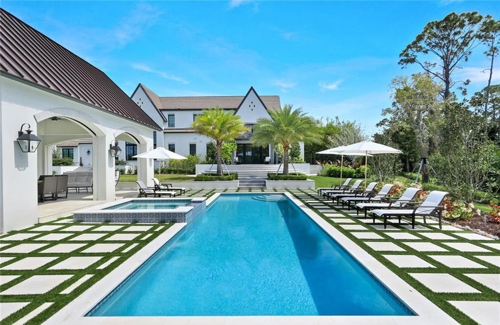 Set on nearly an acre in Audubon Country Club, this 4-bed, 6-bath home, designed by Renee Gaddis and built by the Williams Group, blends modern art deco with French countryside charm.