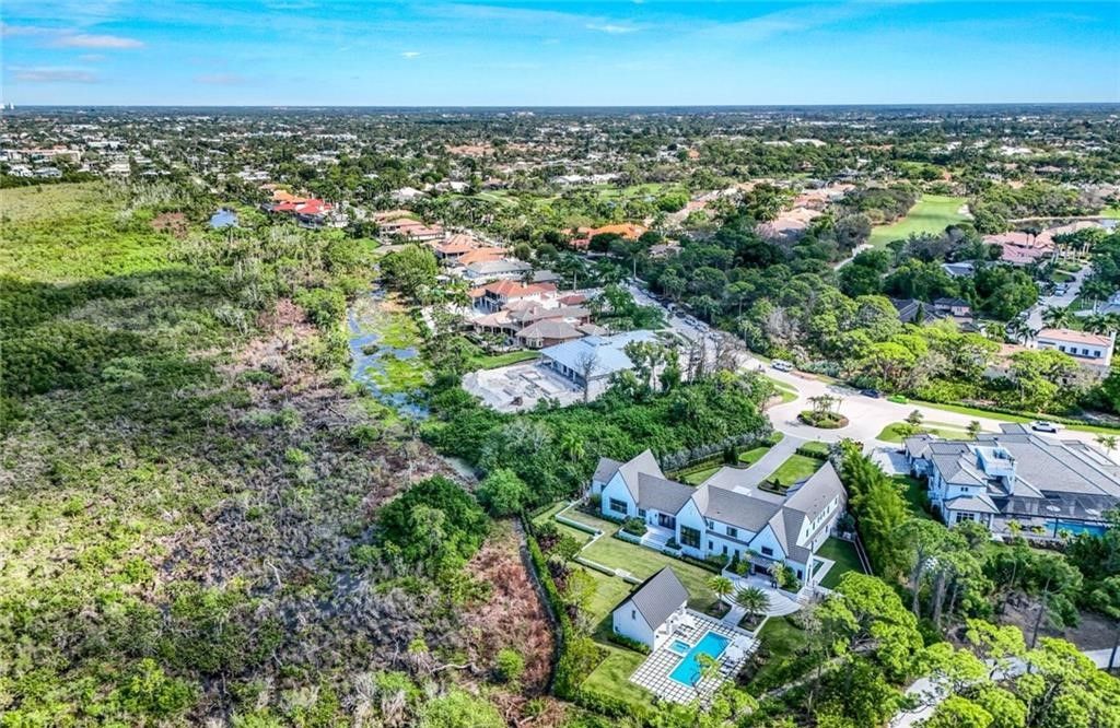 Set on nearly an acre in Audubon Country Club, this 4-bed, 6-bath home, designed by Renee Gaddis and built by the Williams Group, blends modern art deco with French countryside charm.