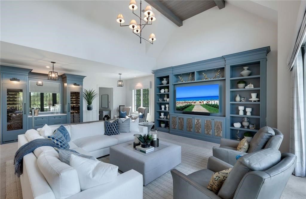 Set on nearly an acre in Audubon Country Club, this 4-bed, 6-bath home, designed by Renee Gaddis and built by the Williams Group, blends modern art deco with French countryside charm.