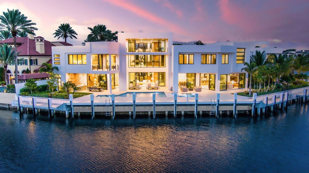 This modern Malibu-inspired estate in Boca Raton's exclusive Sanctuary community offers unparalleled luxury with 170 feet of protected waterfront.