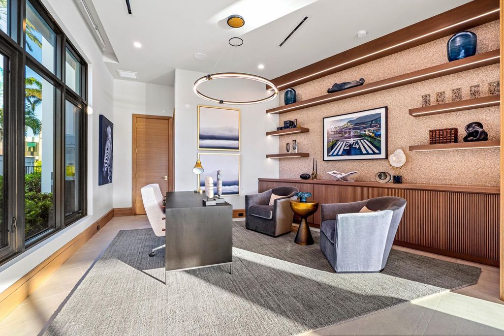 This modern Malibu-inspired estate in Boca Raton's exclusive Sanctuary community offers unparalleled luxury with 170 feet of protected waterfront.