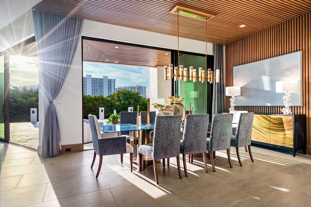 This modern Malibu-inspired estate in Boca Raton's exclusive Sanctuary community offers unparalleled luxury with 170 feet of protected waterfront.