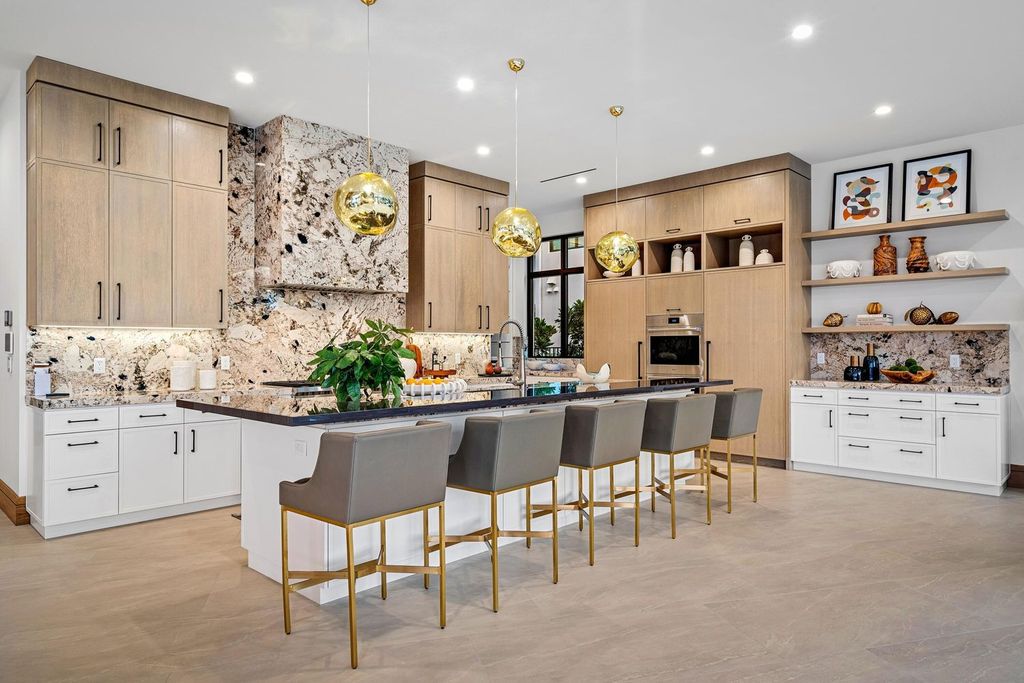 This modern Malibu-inspired estate in Boca Raton's exclusive Sanctuary community offers unparalleled luxury with 170 feet of protected waterfront.