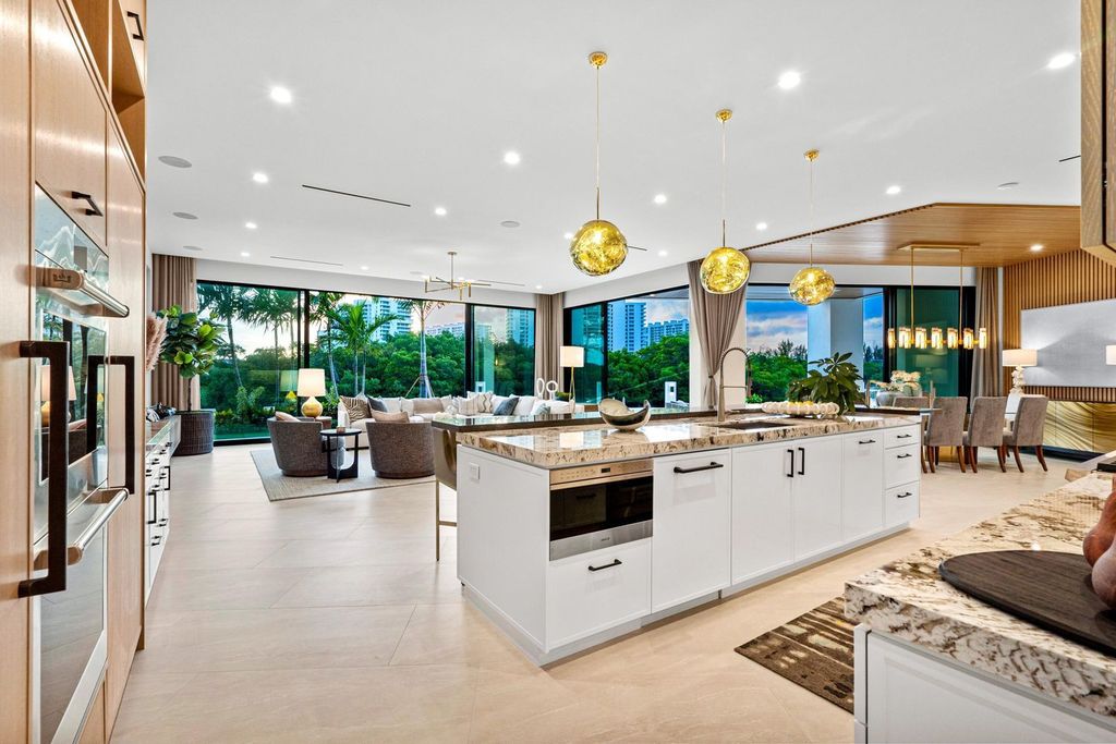 This modern Malibu-inspired estate in Boca Raton's exclusive Sanctuary community offers unparalleled luxury with 170 feet of protected waterfront.