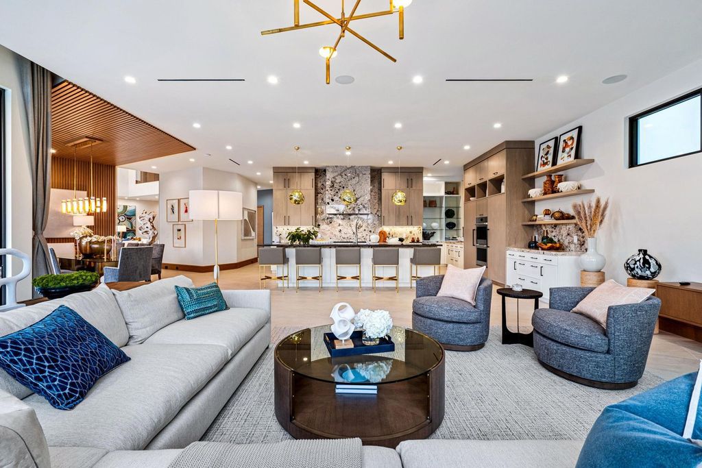 This modern Malibu-inspired estate in Boca Raton's exclusive Sanctuary community offers unparalleled luxury with 170 feet of protected waterfront.