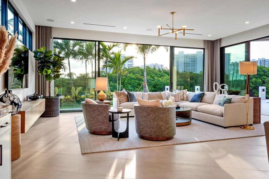 This modern Malibu-inspired estate in Boca Raton's exclusive Sanctuary community offers unparalleled luxury with 170 feet of protected waterfront.