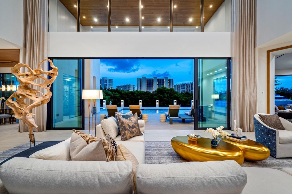This modern Malibu-inspired estate in Boca Raton's exclusive Sanctuary community offers unparalleled luxury with 170 feet of protected waterfront.