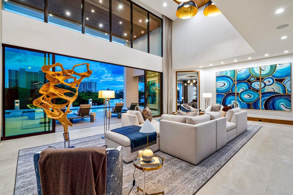 This modern Malibu-inspired estate in Boca Raton's exclusive Sanctuary community offers unparalleled luxury with 170 feet of protected waterfront.