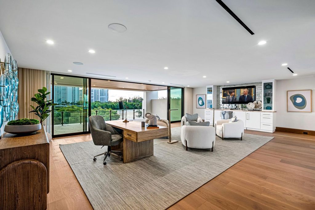 This modern Malibu-inspired estate in Boca Raton's exclusive Sanctuary community offers unparalleled luxury with 170 feet of protected waterfront.