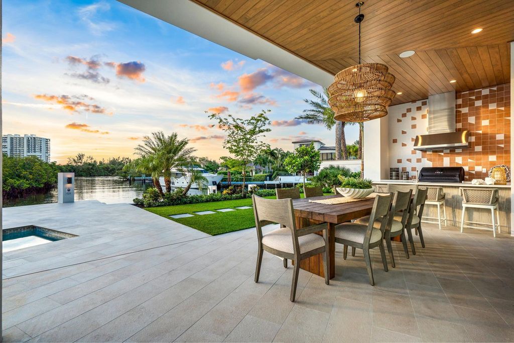 This modern Malibu-inspired estate in Boca Raton's exclusive Sanctuary community offers unparalleled luxury with 170 feet of protected waterfront.