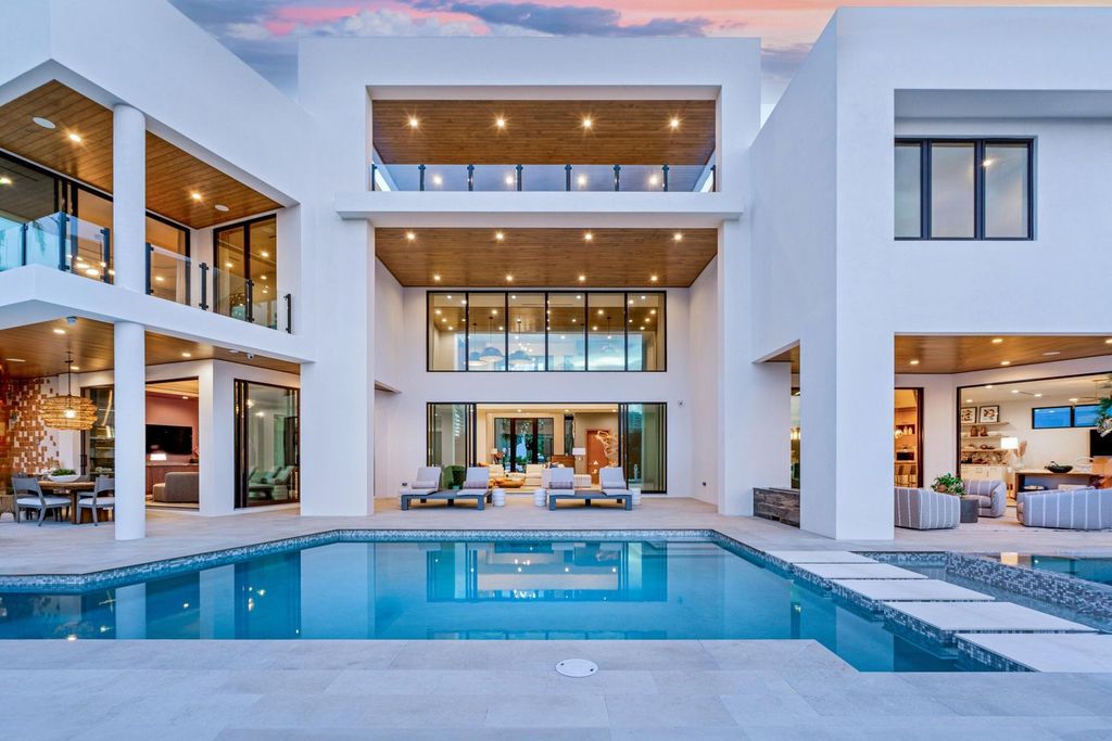 This modern Malibu-inspired estate in Boca Raton's exclusive Sanctuary community offers unparalleled luxury with 170 feet of protected waterfront.