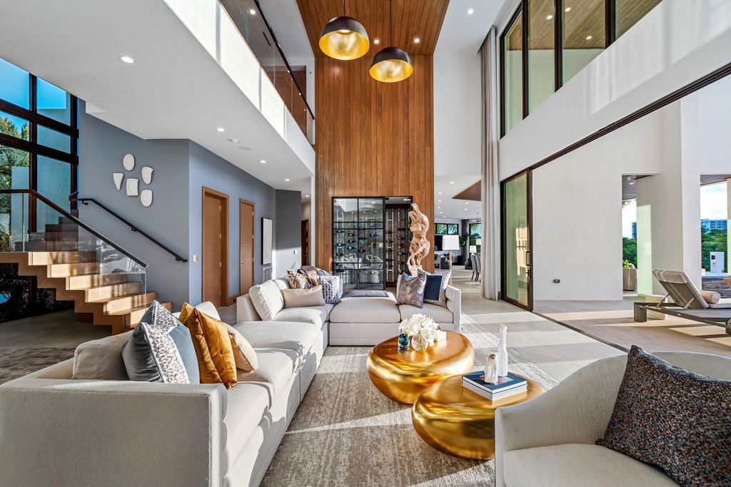 This modern Malibu-inspired estate in Boca Raton's exclusive Sanctuary community offers unparalleled luxury with 170 feet of protected waterfront.