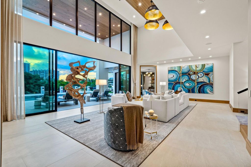 This modern Malibu-inspired estate in Boca Raton's exclusive Sanctuary community offers unparalleled luxury with 170 feet of protected waterfront.