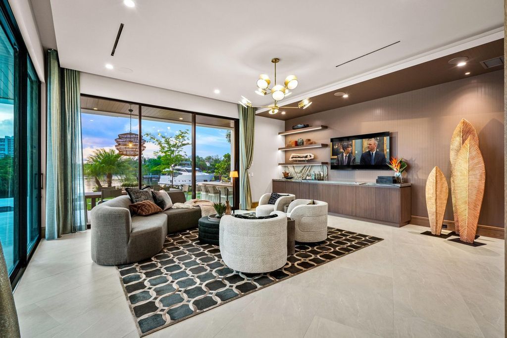 This modern Malibu-inspired estate in Boca Raton's exclusive Sanctuary community offers unparalleled luxury with 170 feet of protected waterfront.