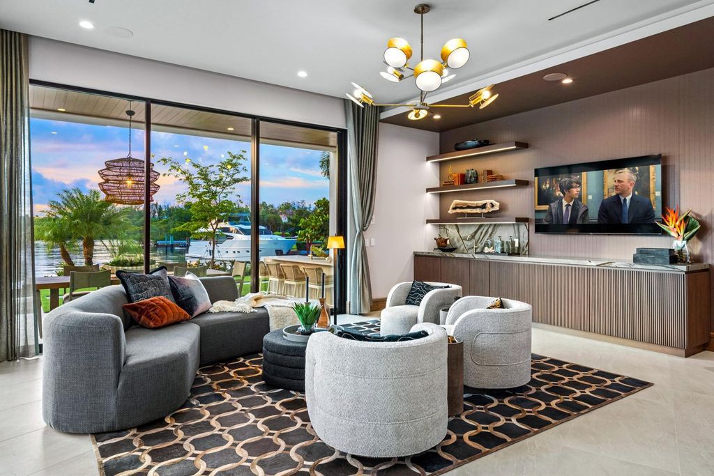 This modern Malibu-inspired estate in Boca Raton's exclusive Sanctuary community offers unparalleled luxury with 170 feet of protected waterfront.