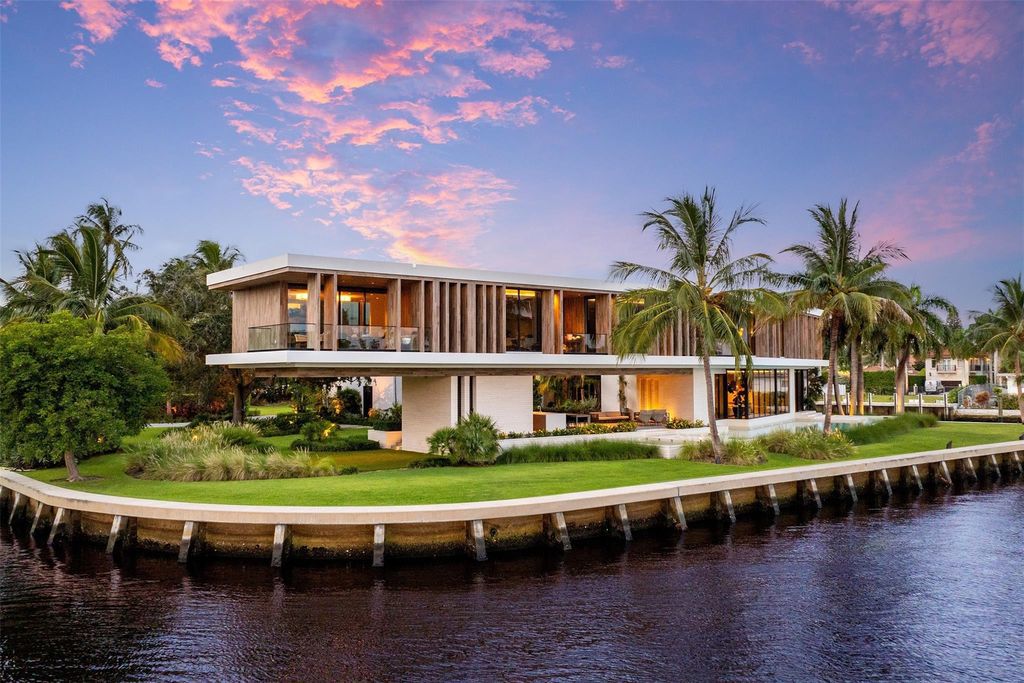 Experience unmatched luxury at 516 Mola Ave, a gated peninsula estate designed by Max Strang and built by Bomar Builders.