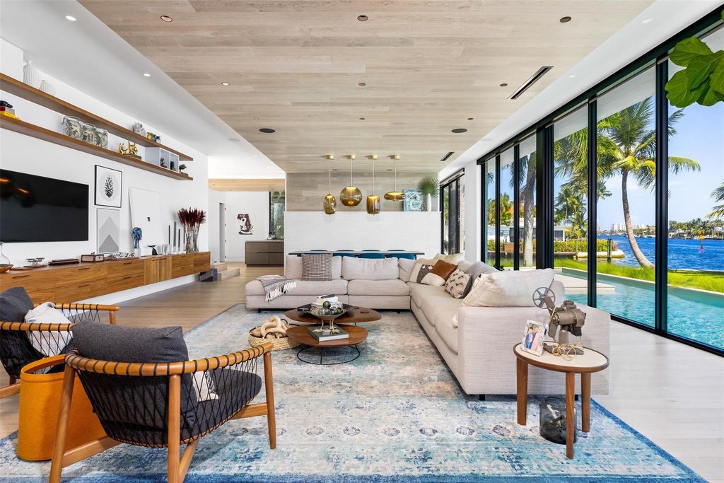 Experience unmatched luxury at 516 Mola Ave, a gated peninsula estate designed by Max Strang and built by Bomar Builders.