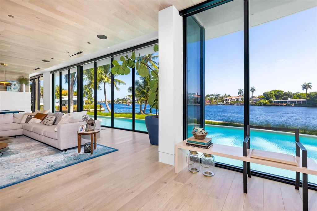 Experience unmatched luxury at 516 Mola Ave, a gated peninsula estate designed by Max Strang and built by Bomar Builders.