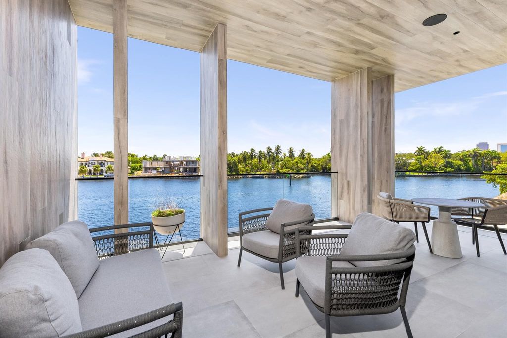 Experience unmatched luxury at 516 Mola Ave, a gated peninsula estate designed by Max Strang and built by Bomar Builders.