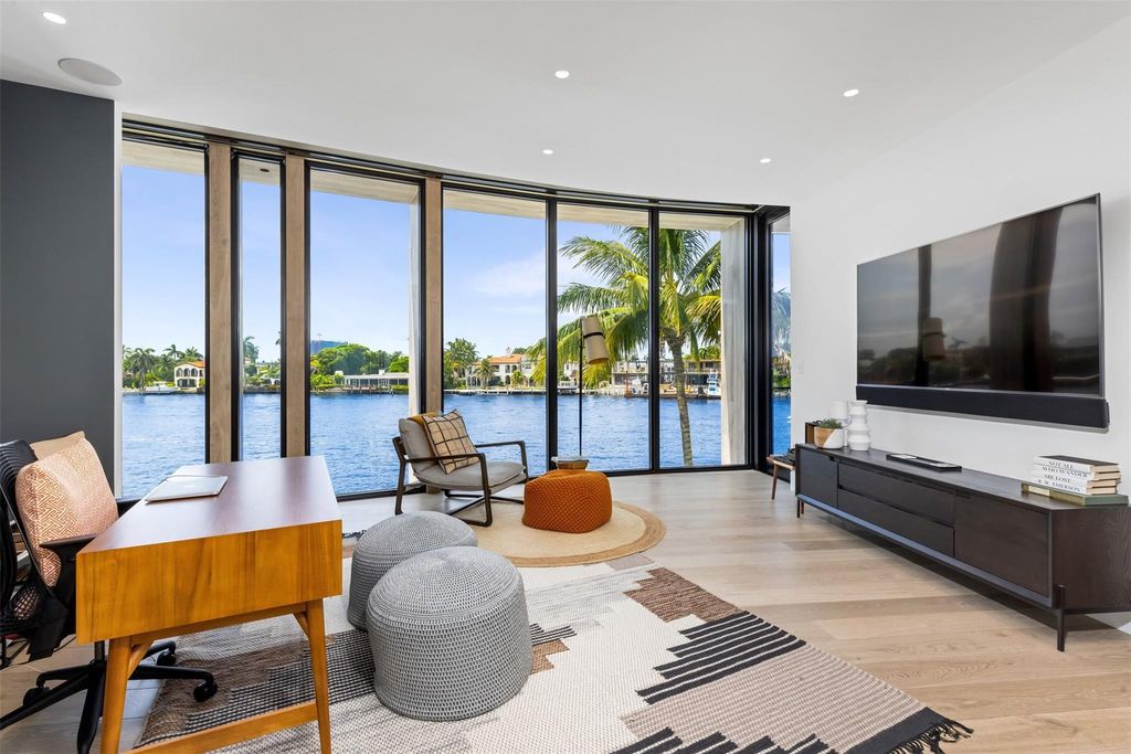 Experience unmatched luxury at 516 Mola Ave, a gated peninsula estate designed by Max Strang and built by Bomar Builders.