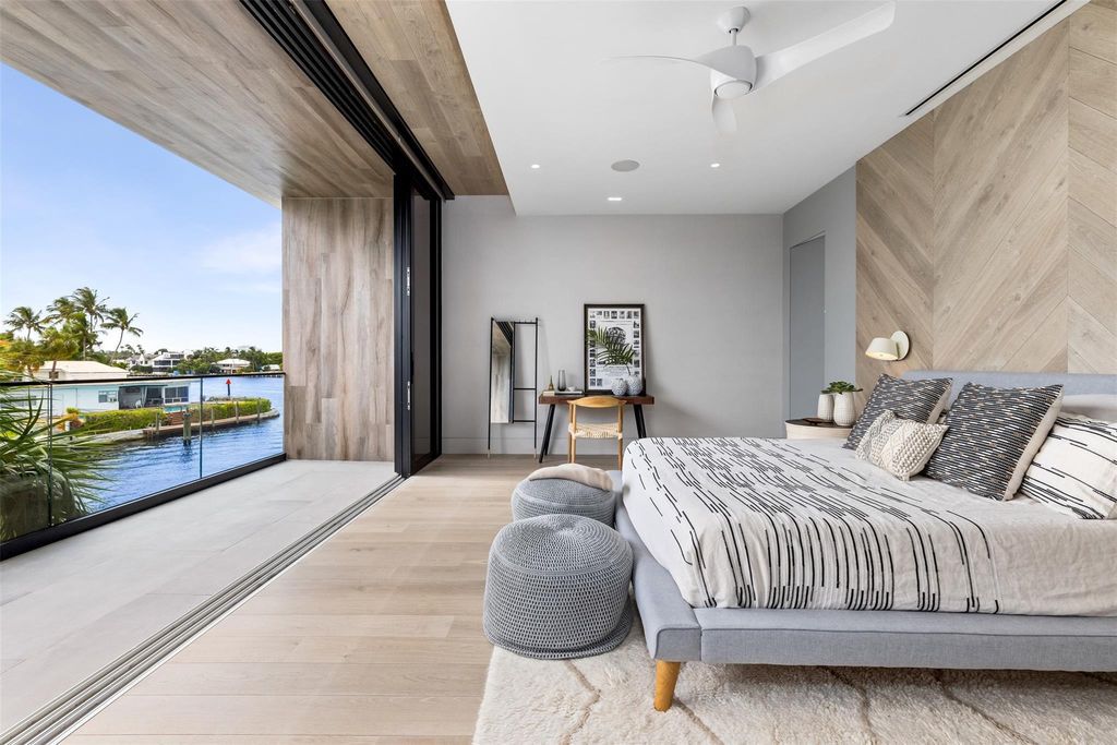 Experience unmatched luxury at 516 Mola Ave, a gated peninsula estate designed by Max Strang and built by Bomar Builders.