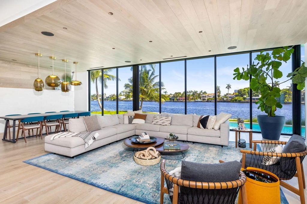 Experience unmatched luxury at 516 Mola Ave, a gated peninsula estate designed by Max Strang and built by Bomar Builders.