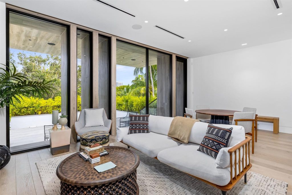 Experience unmatched luxury at 516 Mola Ave, a gated peninsula estate designed by Max Strang and built by Bomar Builders.