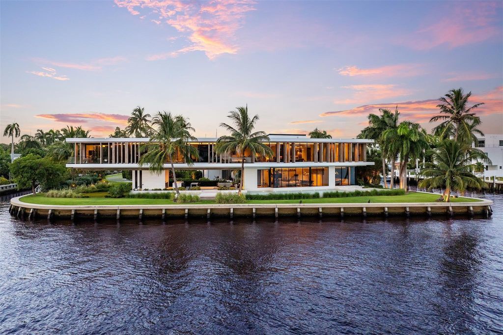 Experience unmatched luxury at 516 Mola Ave, a gated peninsula estate designed by Max Strang and built by Bomar Builders.