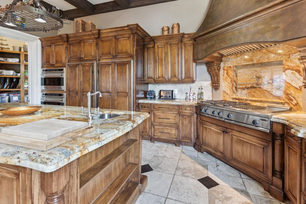 Featured on HGTV's Extreme Homes, this Tuscan-inspired masterpiece sits on a sprawling 1.87-acre lot, boasting over 400 feet of stunning water frontage along Choctawhatchee Bay and Jones Bayou.