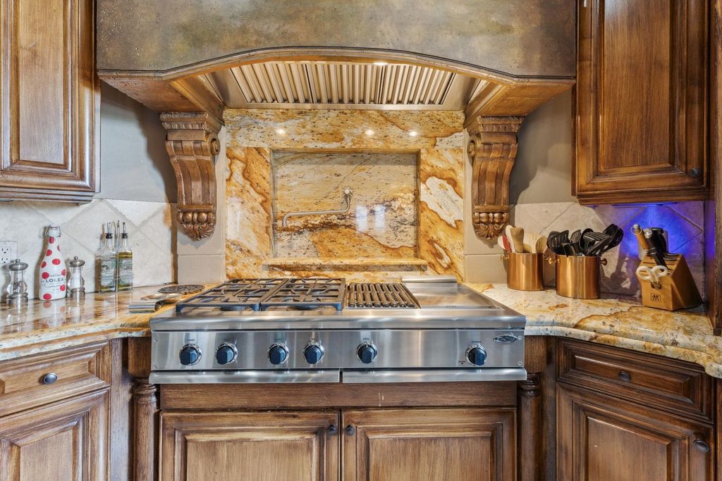 Featured on HGTV's Extreme Homes, this Tuscan-inspired masterpiece sits on a sprawling 1.87-acre lot, boasting over 400 feet of stunning water frontage along Choctawhatchee Bay and Jones Bayou.