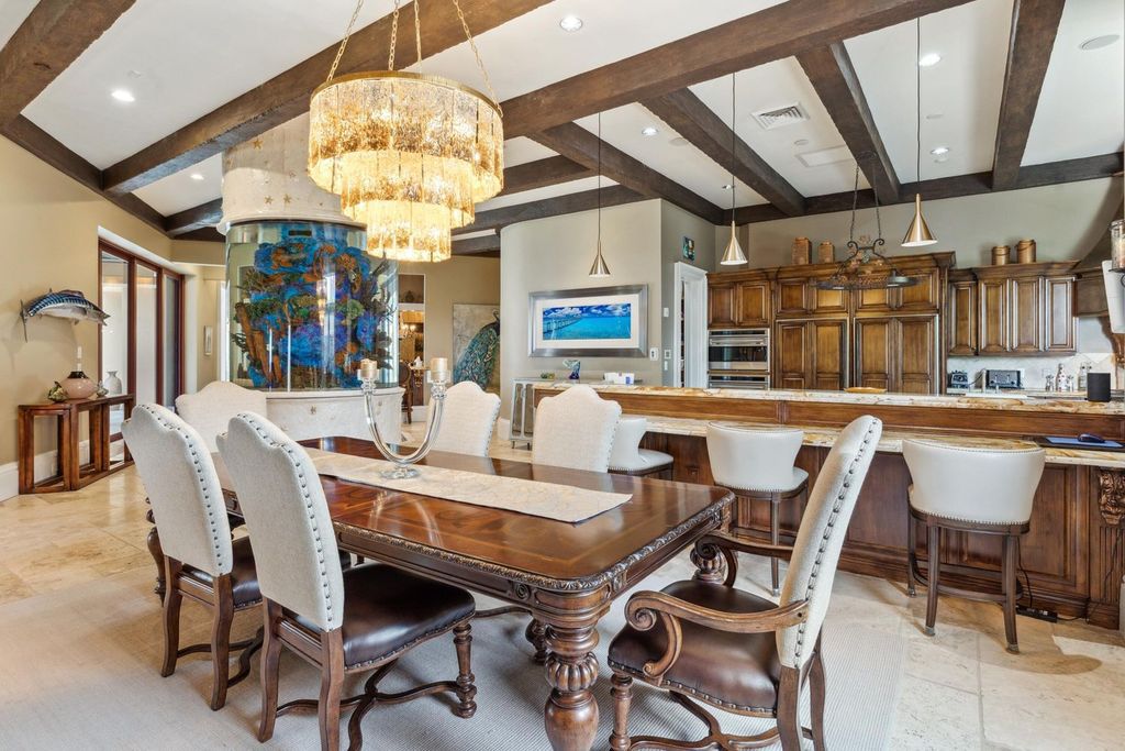 Featured on HGTV's Extreme Homes, this Tuscan-inspired masterpiece sits on a sprawling 1.87-acre lot, boasting over 400 feet of stunning water frontage along Choctawhatchee Bay and Jones Bayou.