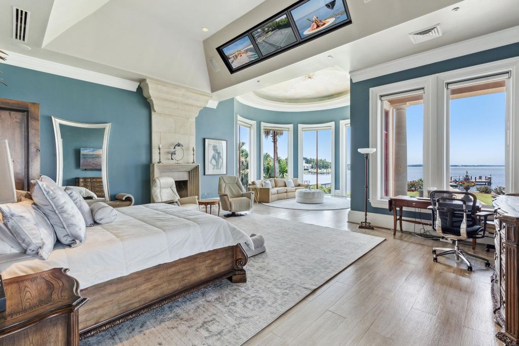Featured on HGTV's Extreme Homes, this Tuscan-inspired masterpiece sits on a sprawling 1.87-acre lot, boasting over 400 feet of stunning water frontage along Choctawhatchee Bay and Jones Bayou.