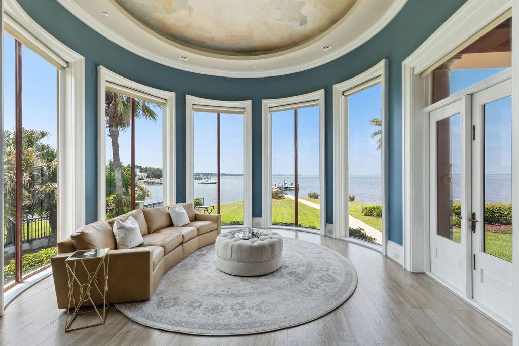 Featured on HGTV's Extreme Homes, this Tuscan-inspired masterpiece sits on a sprawling 1.87-acre lot, boasting over 400 feet of stunning water frontage along Choctawhatchee Bay and Jones Bayou.