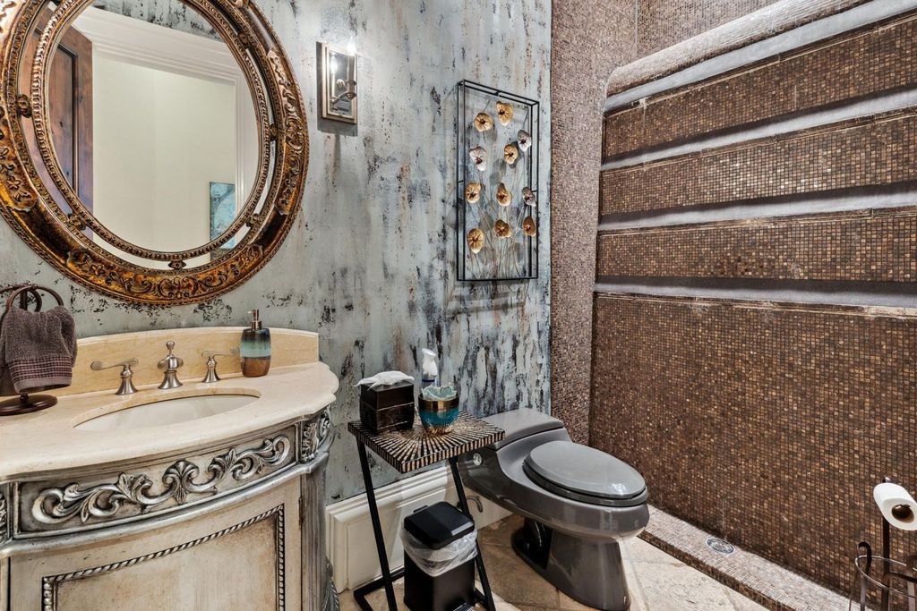 Featured on HGTV's Extreme Homes, this Tuscan-inspired masterpiece sits on a sprawling 1.87-acre lot, boasting over 400 feet of stunning water frontage along Choctawhatchee Bay and Jones Bayou.
