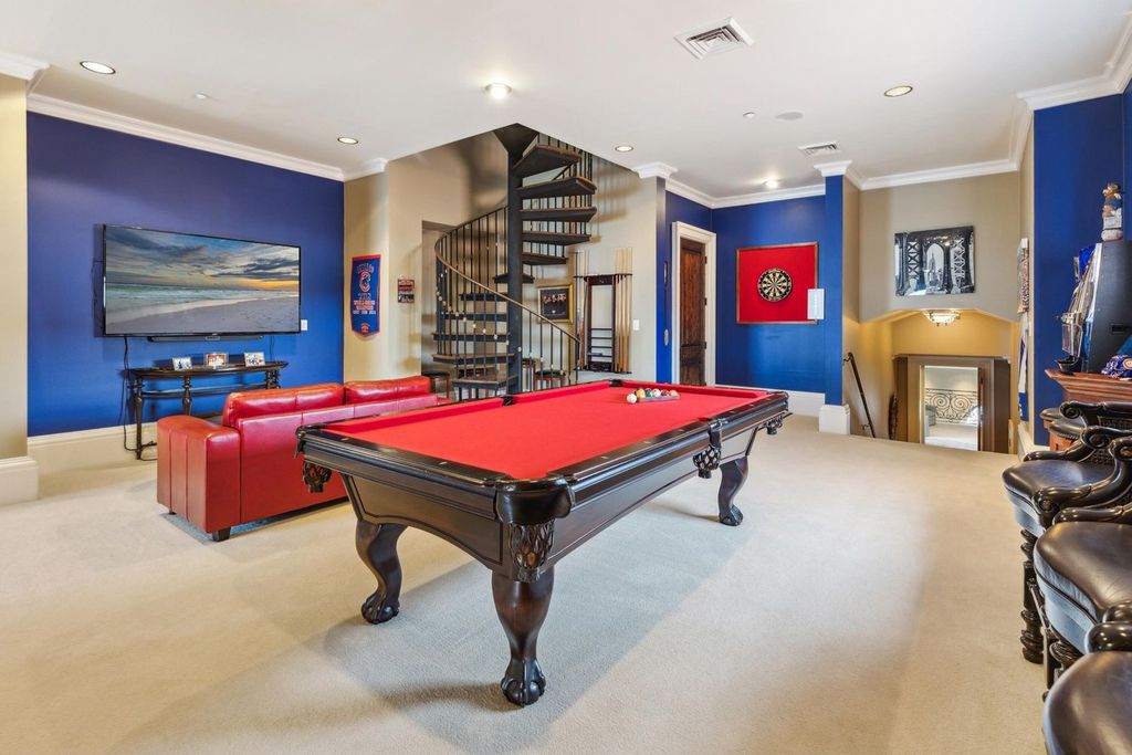 Featured on HGTV's Extreme Homes, this Tuscan-inspired masterpiece sits on a sprawling 1.87-acre lot, boasting over 400 feet of stunning water frontage along Choctawhatchee Bay and Jones Bayou.